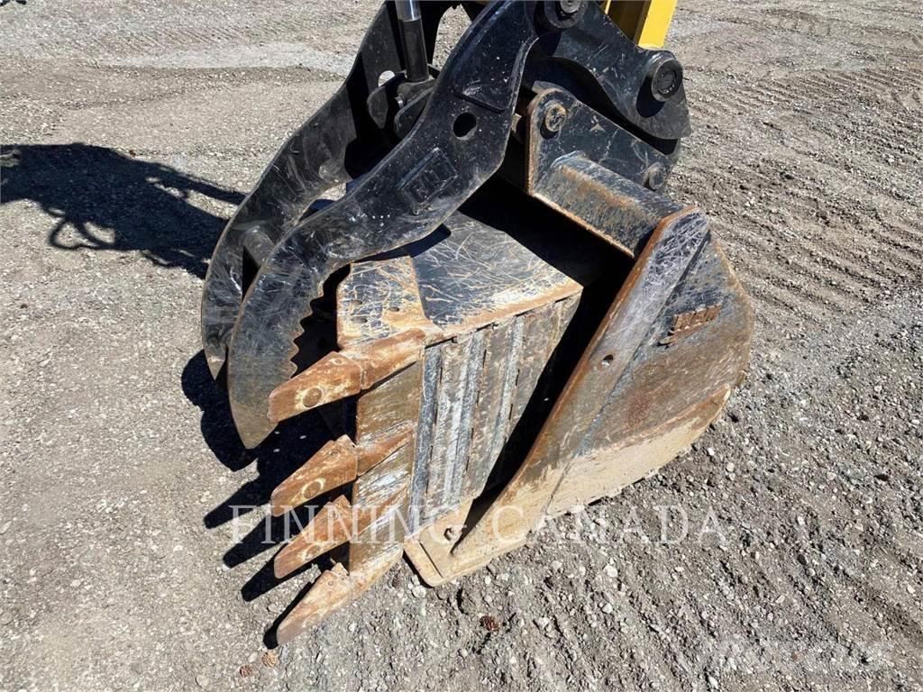 CAT 310-07 Pelle sur chenilles