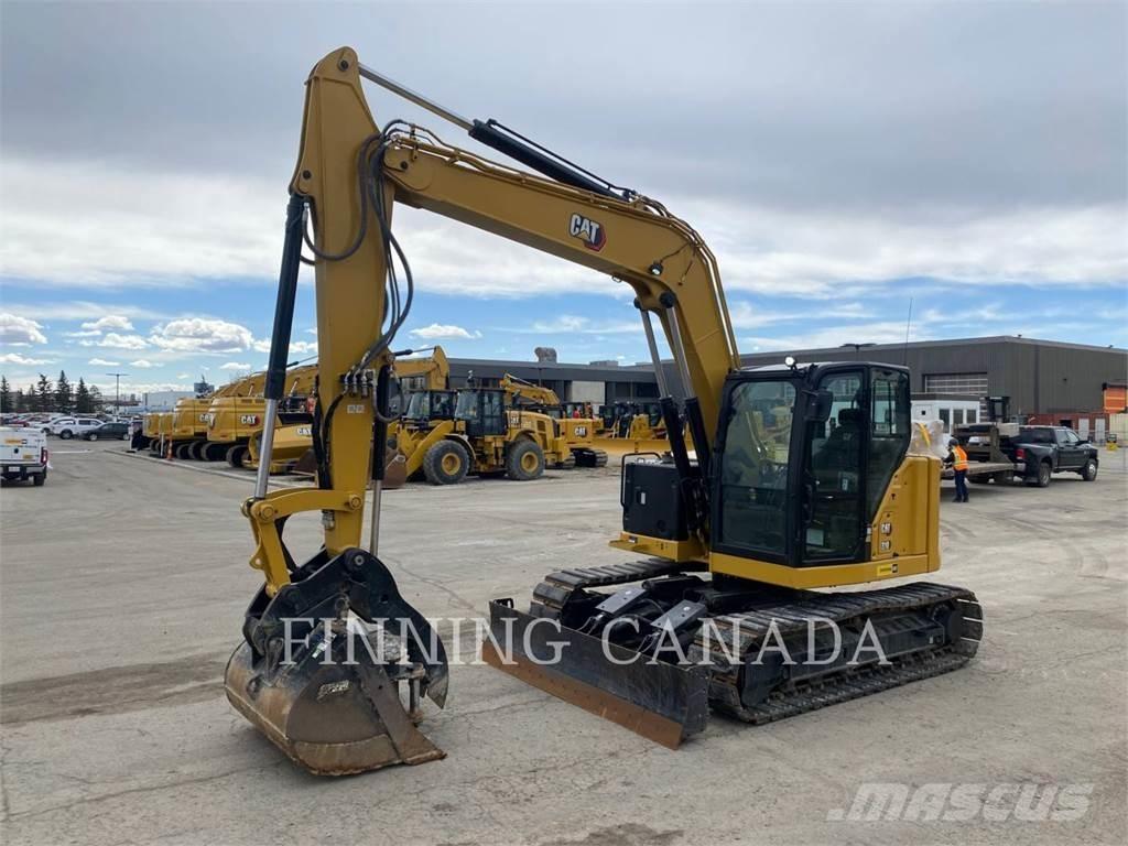 CAT 310-07 Pelle sur chenilles