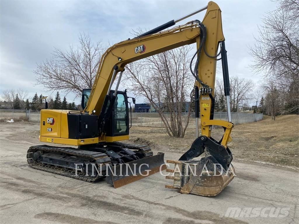 CAT 310-07 Pelle sur chenilles