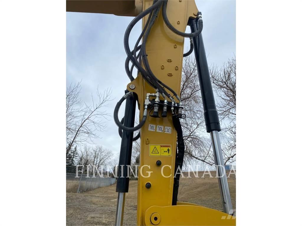 CAT 310-07 Pelle sur chenilles