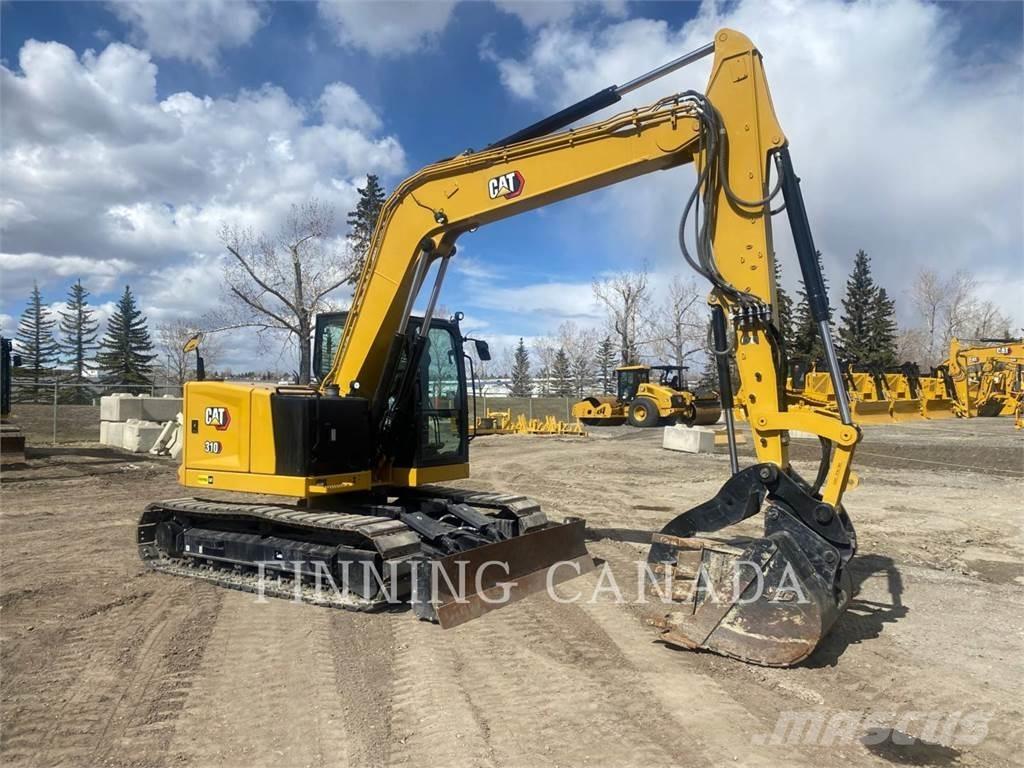 CAT 310-07 Pelle sur chenilles