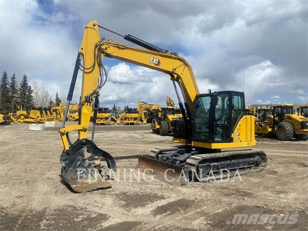CAT 310-07 Pelle sur chenilles