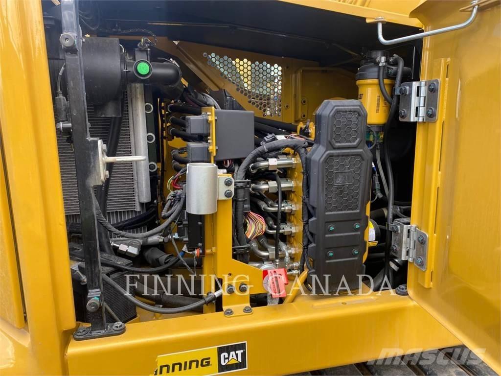CAT 310-07 Pelle sur chenilles