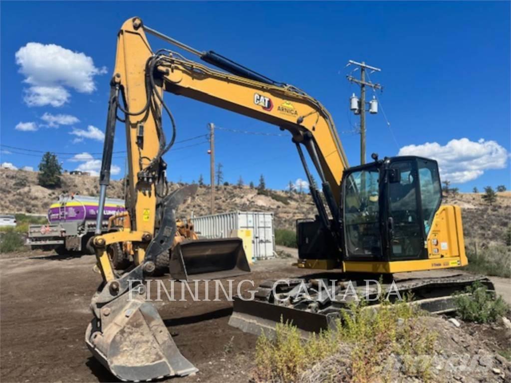 CAT 310-07 Pelle sur chenilles