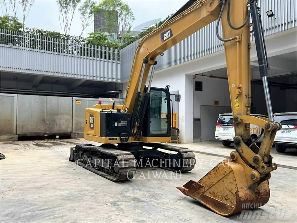 CAT 310-07 Pelle sur chenilles