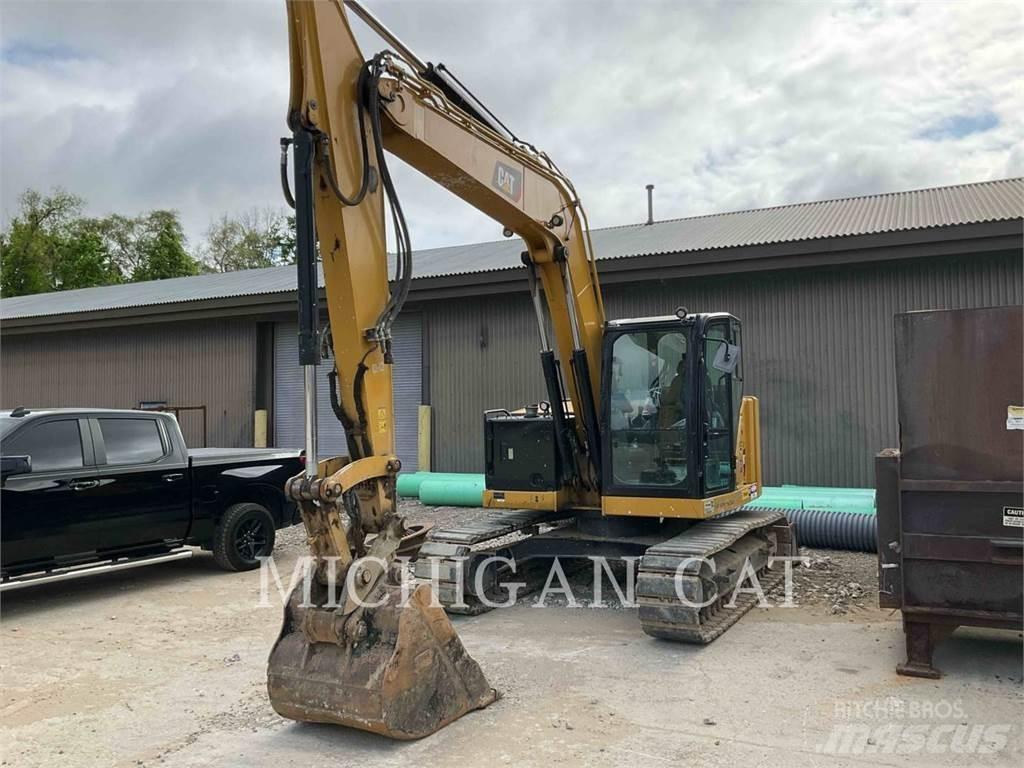 CAT 310 AQ Pelle sur chenilles