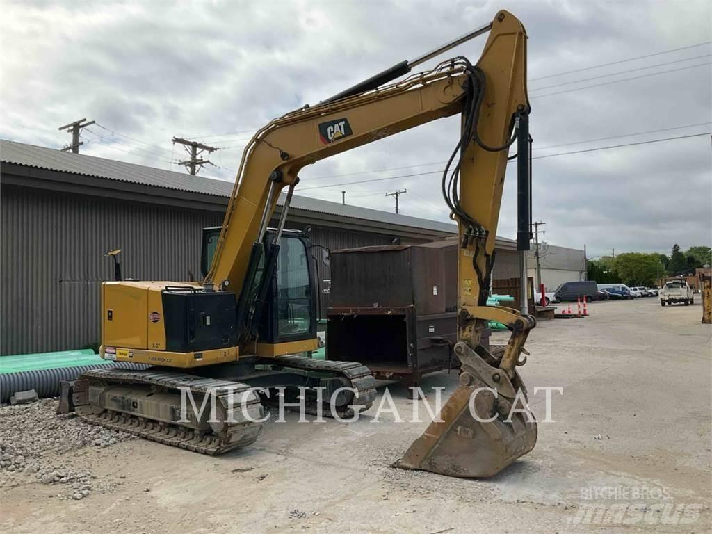 CAT 310 AQ Pelle sur chenilles
