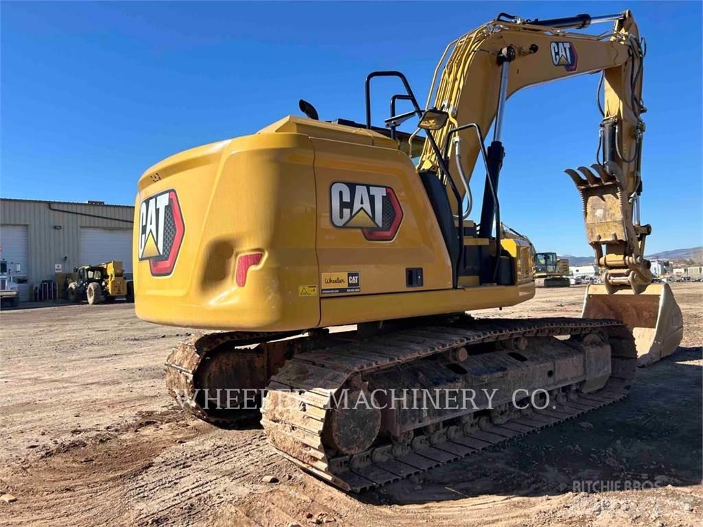 CAT 317 TH Pelle sur chenilles