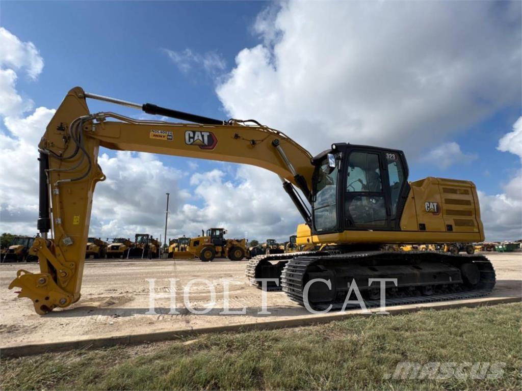 CAT 323 TC Chargeuse sur pneus