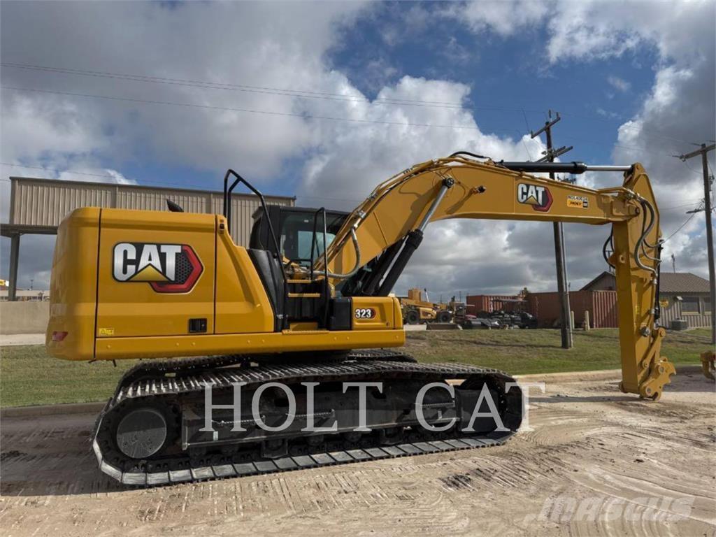 CAT 323 TC Chargeuse sur pneus