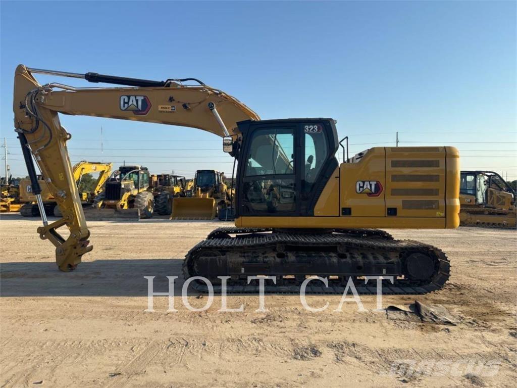 CAT 323 TC Chargeuse sur pneus