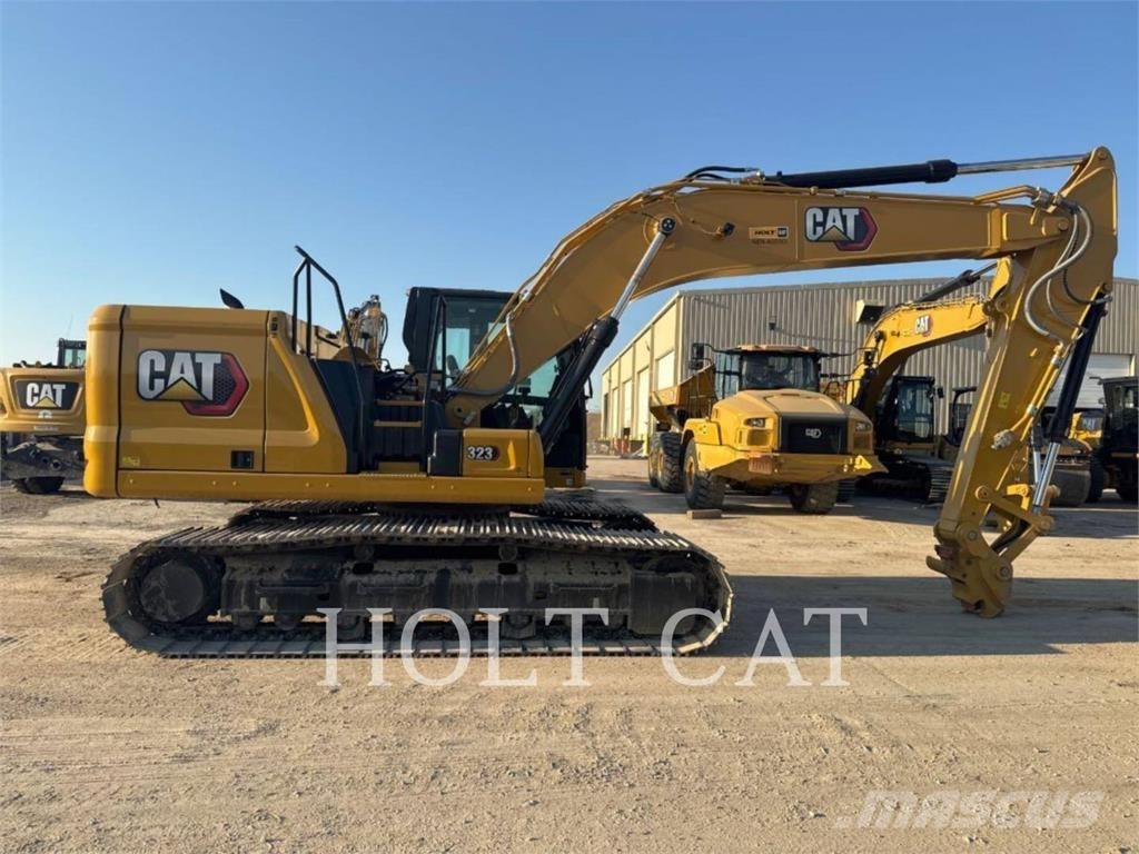 CAT 323 TC Chargeuse sur pneus