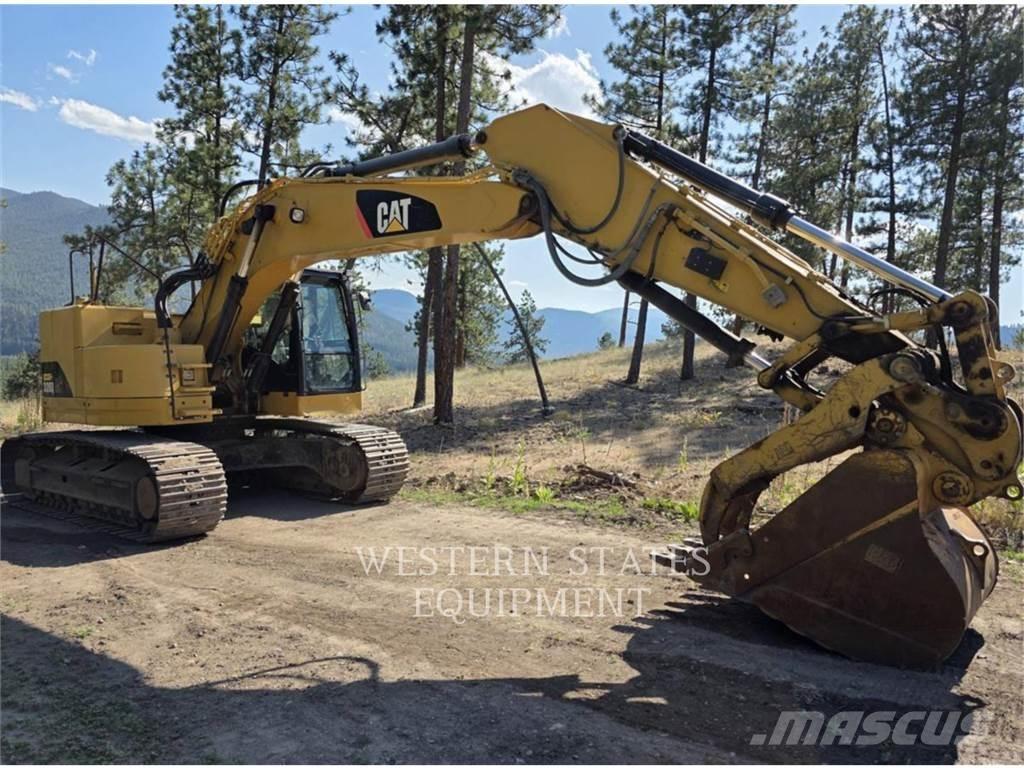 CAT 328D Pelle sur chenilles