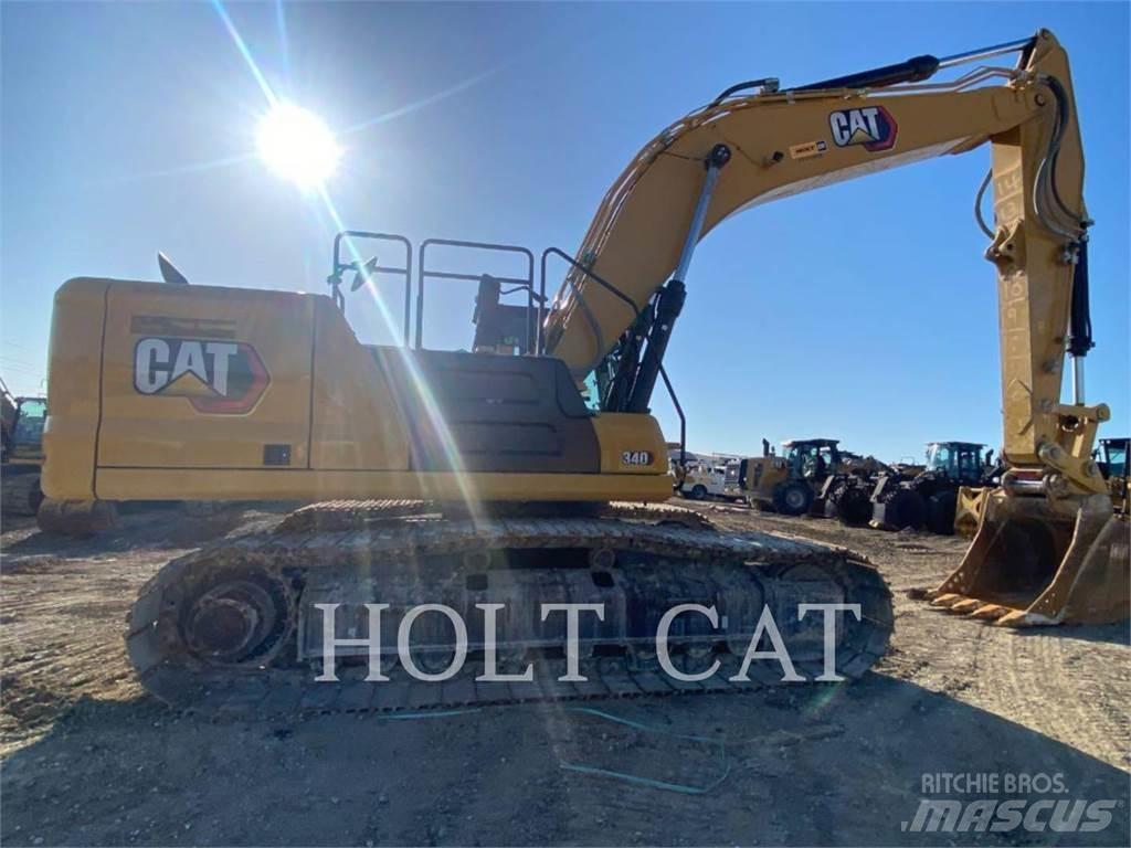 CAT 340 12 TC Chargeuse sur pneus