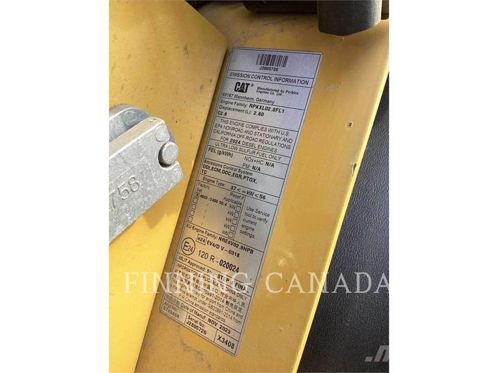CAT 908 Chargeuse sur pneus
