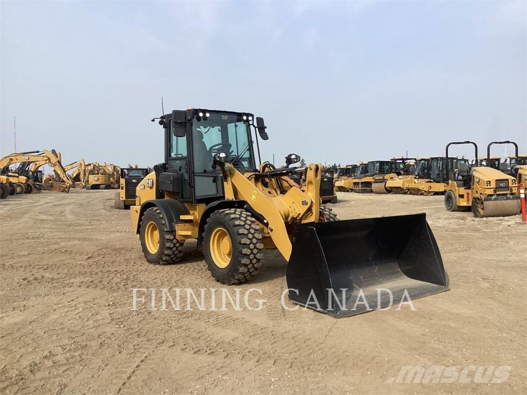 CAT 908 Chargeuse sur pneus