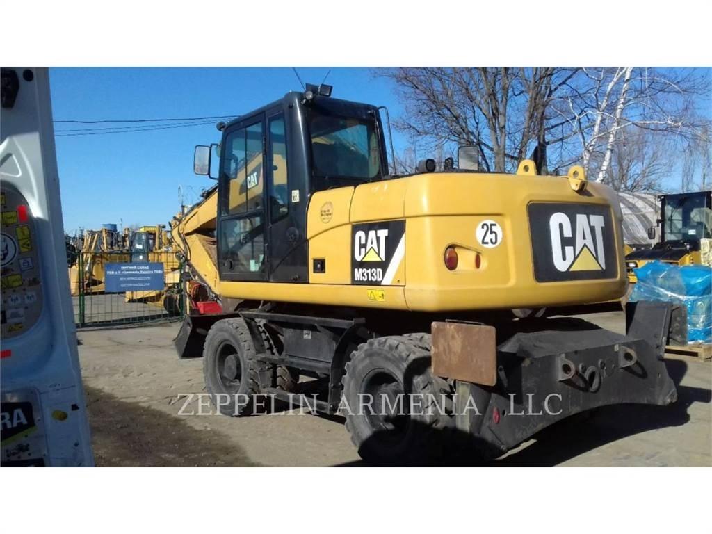 CAT M313D Pelle sur pneus