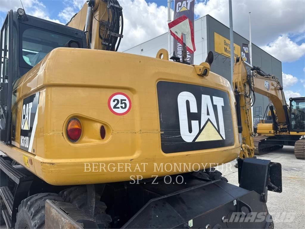 CAT M313D Pelle sur pneus
