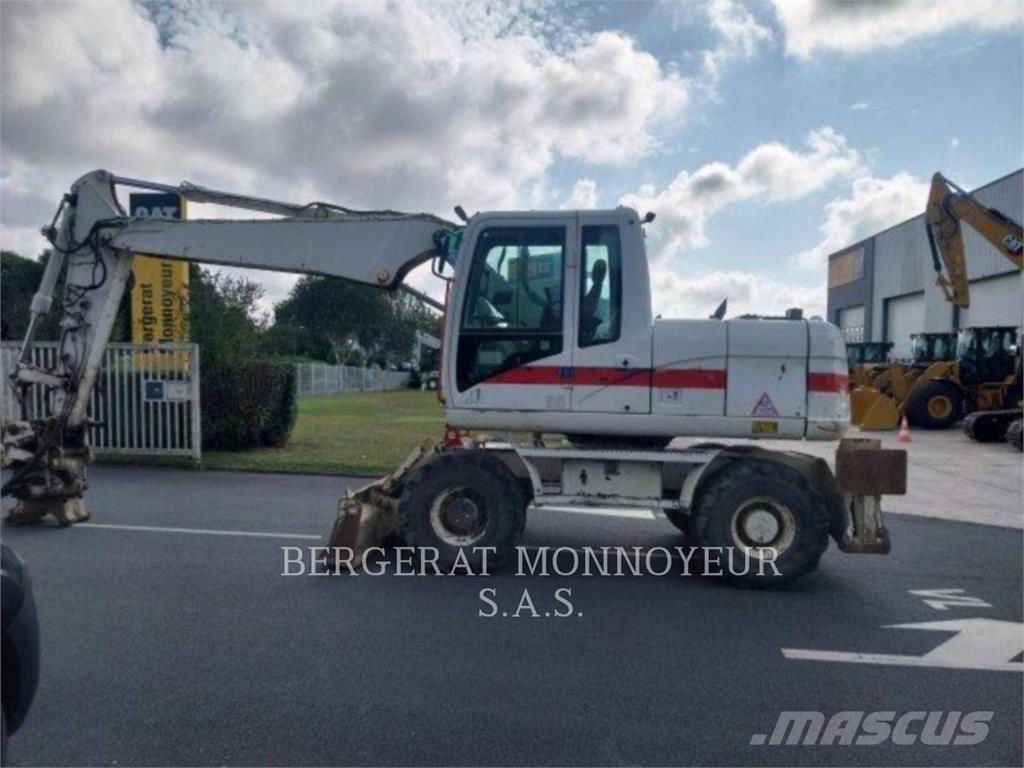 CAT M313D Pelle sur pneus