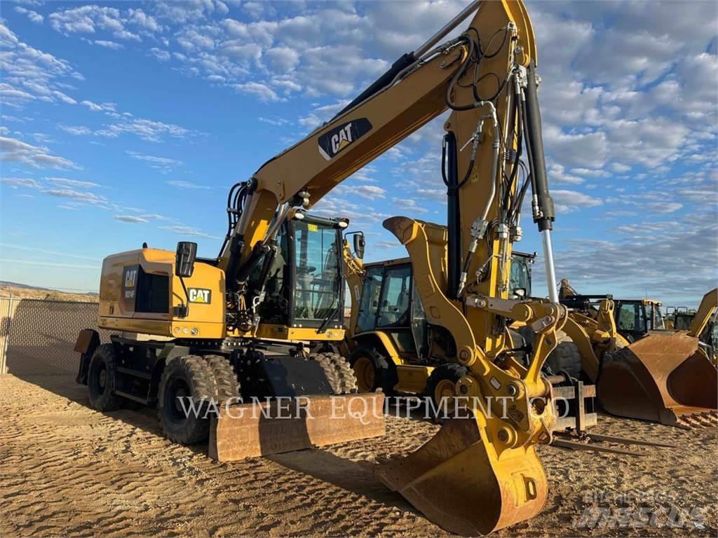 CAT M314F Pelle sur pneus