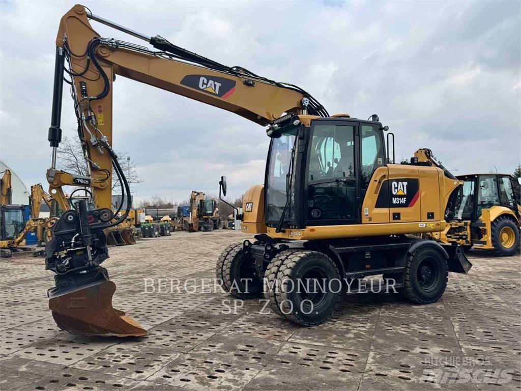 CAT M314F Pelle sur pneus