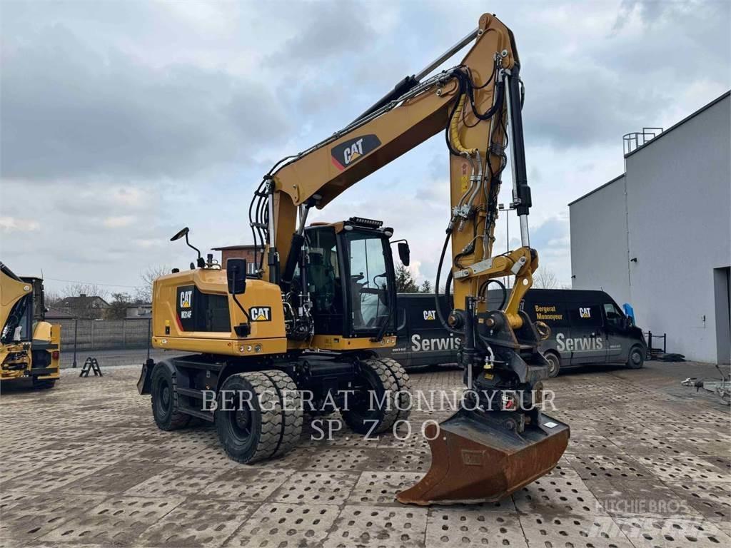 CAT M314F Pelle sur pneus