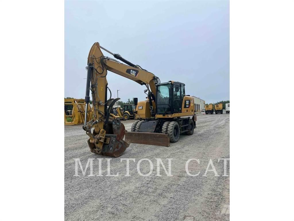 CAT M314F Pelle sur pneus
