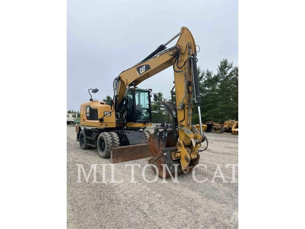 CAT M314F Pelle sur pneus