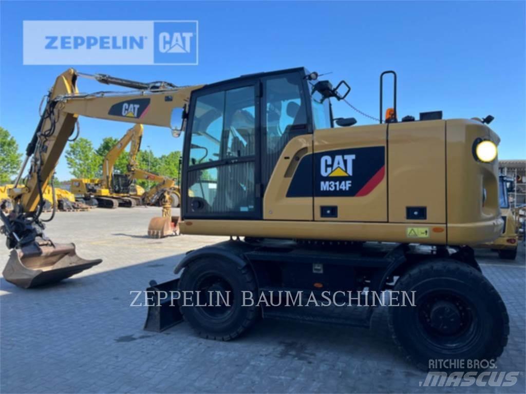 CAT M314F Pelle sur pneus