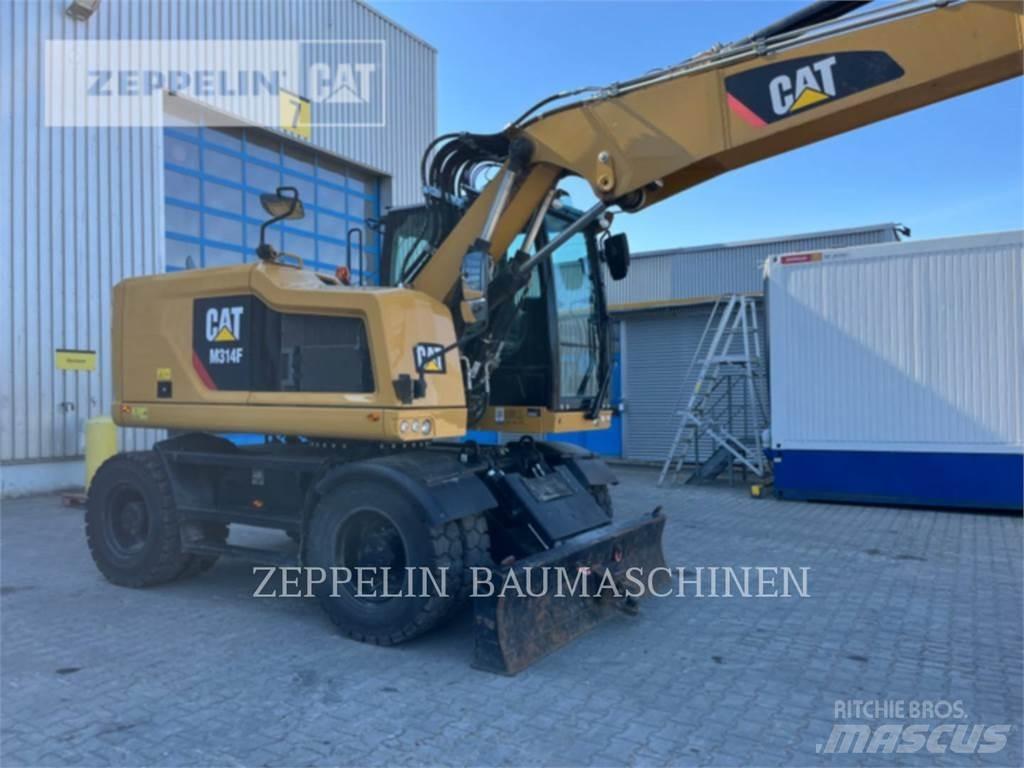 CAT M314F Pelle sur pneus