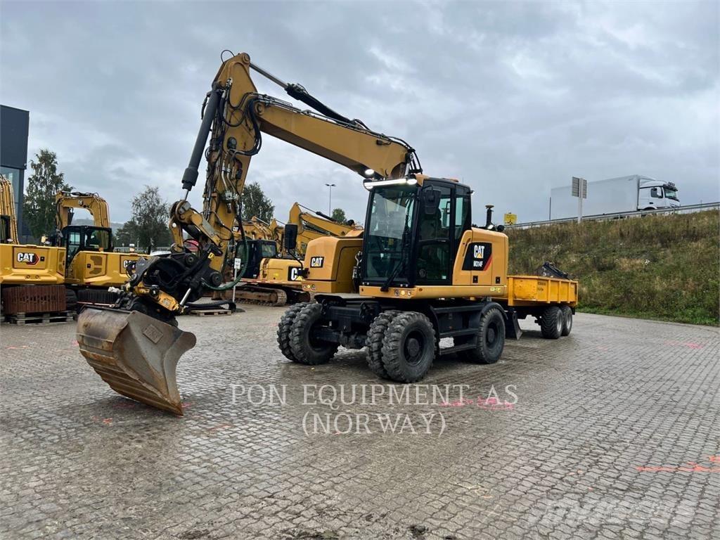 CAT M314F Pelle sur pneus