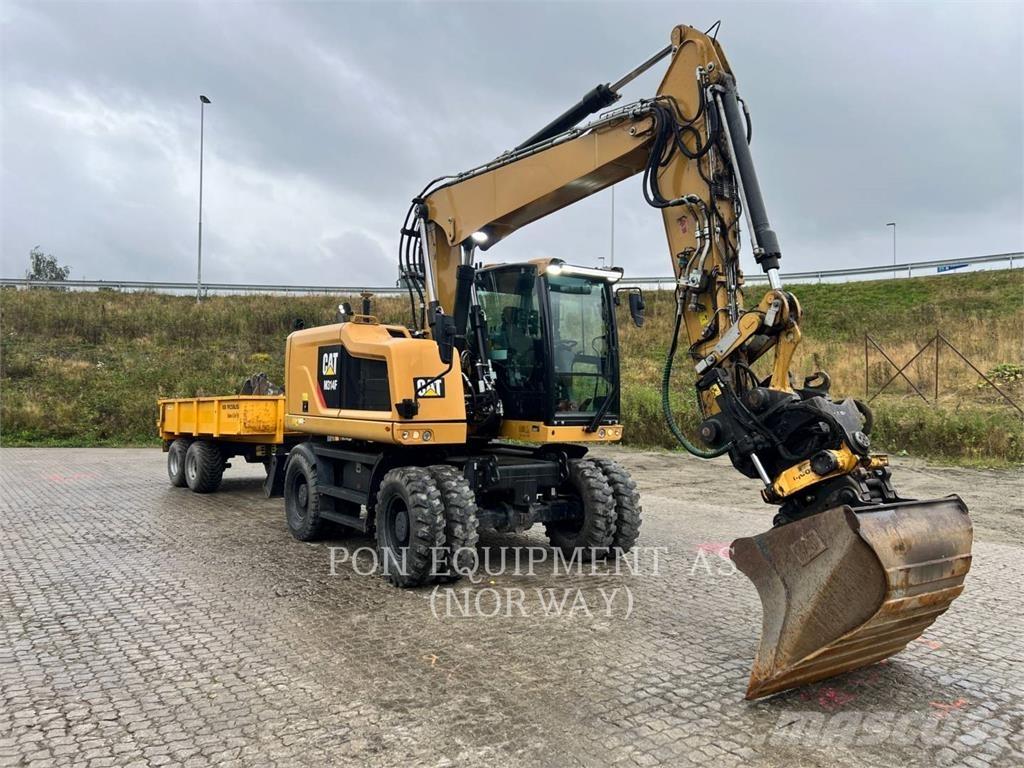 CAT M314F Pelle sur pneus