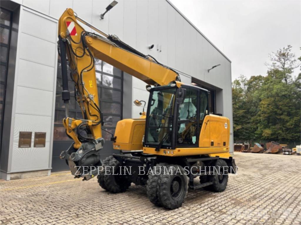 CAT M314F Pelle sur pneus