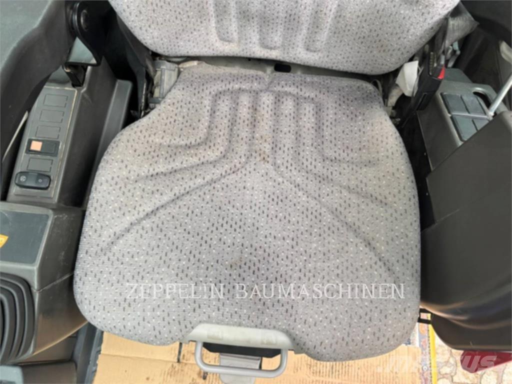 CAT M314F Pelle sur pneus