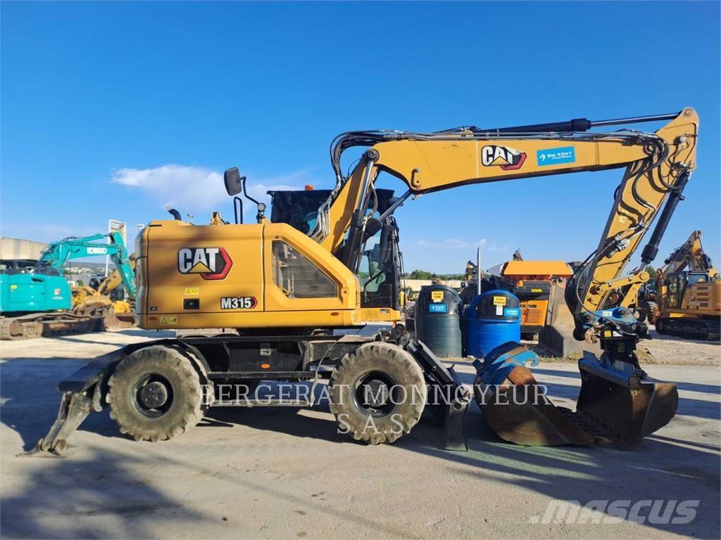 CAT M315 Pelle sur pneus