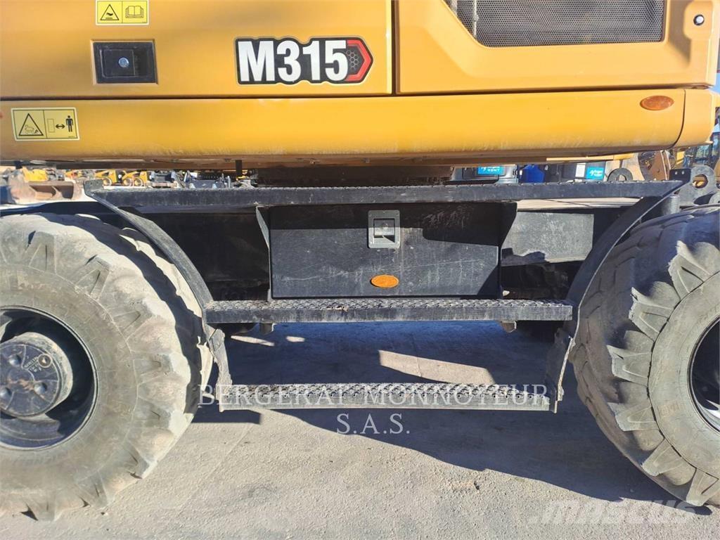 CAT M315 Pelle sur pneus