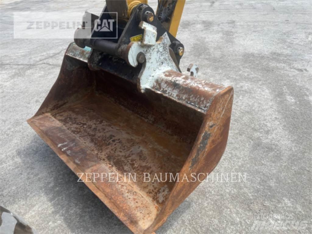 CAT M315-07A Pelle sur pneus