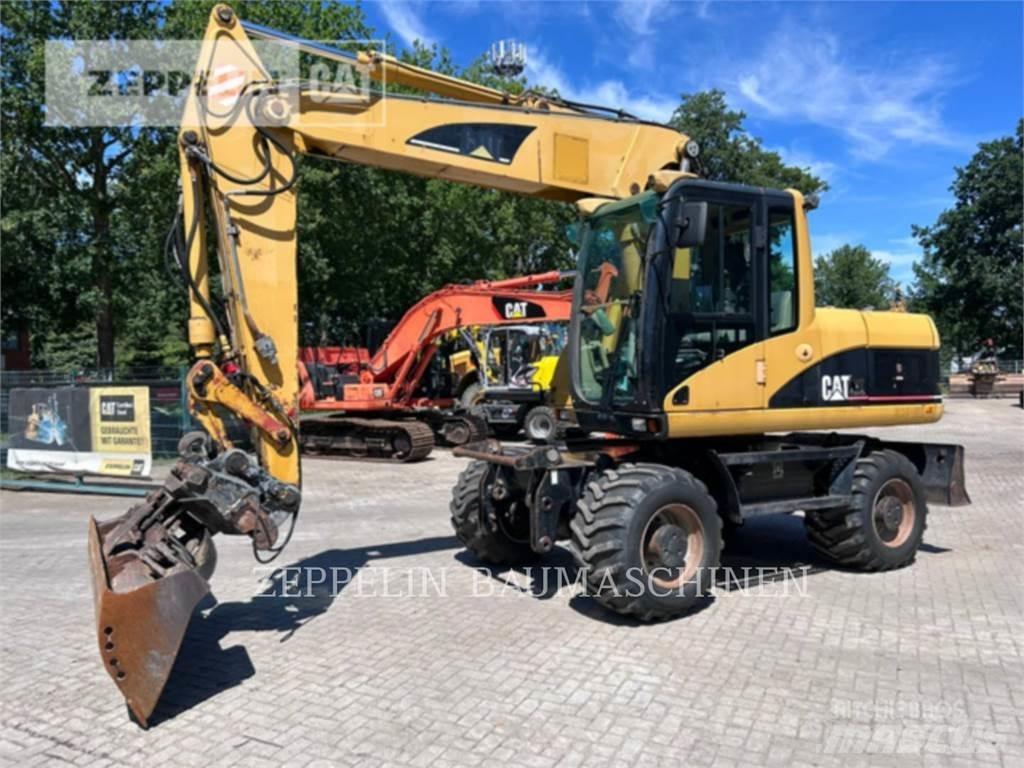 CAT M315C Pelle sur pneus
