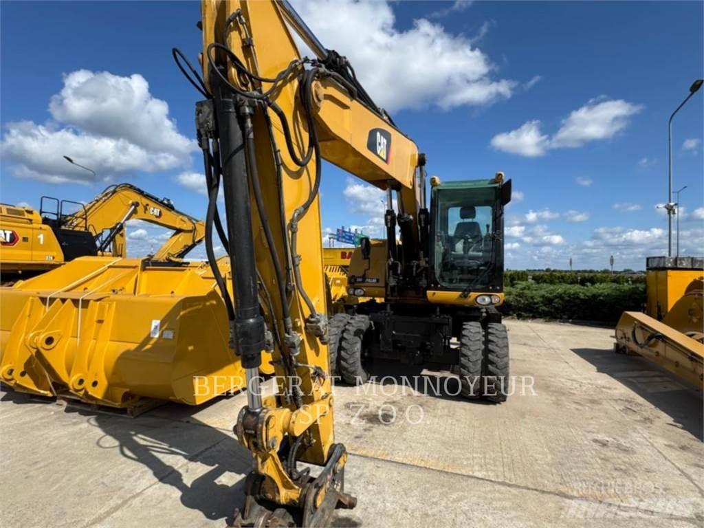 CAT M315D Pelle sur pneus