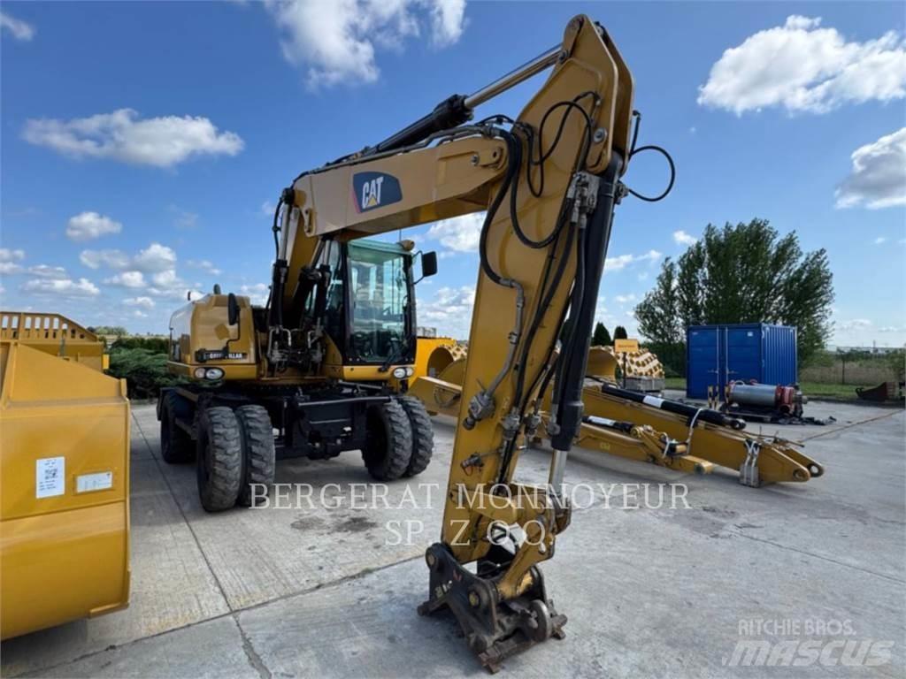 CAT M315D Pelle sur pneus