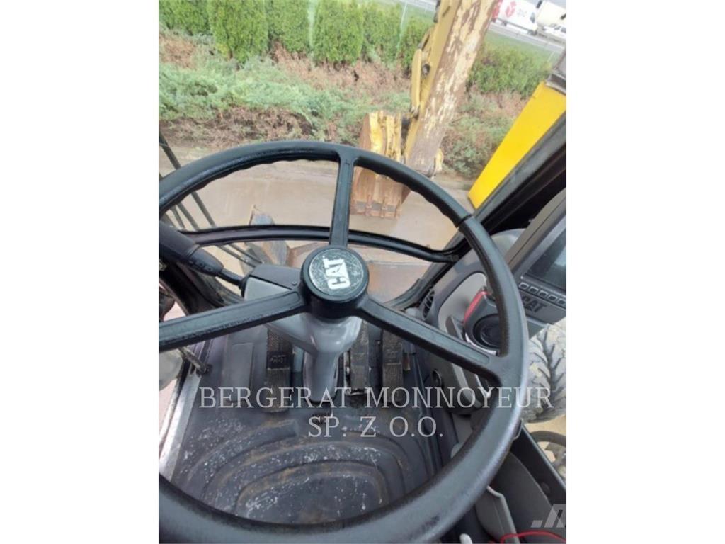 CAT M315D Pelle sur pneus