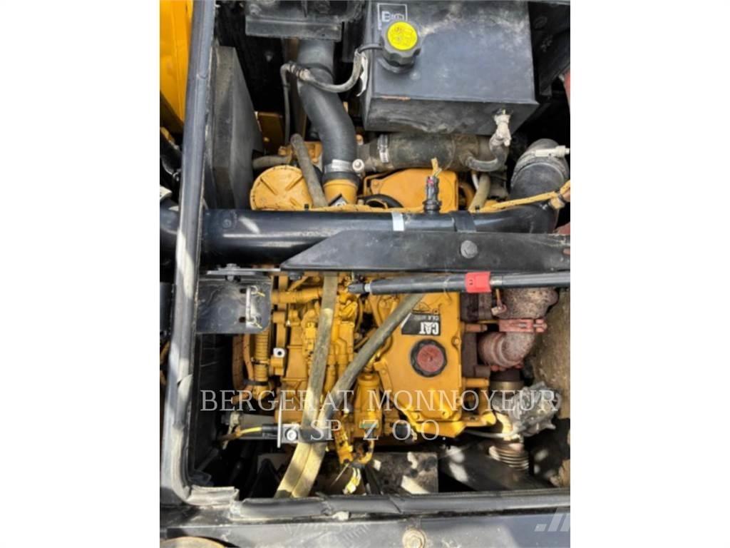 CAT M315F Pelle sur pneus