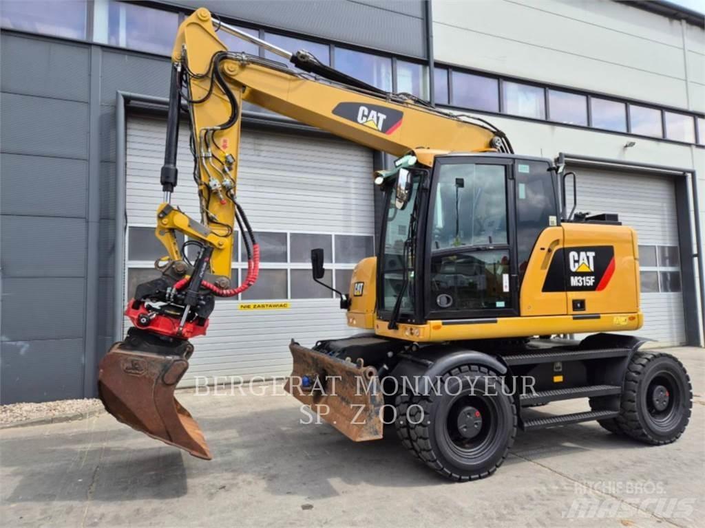 CAT M315F Pelle sur pneus