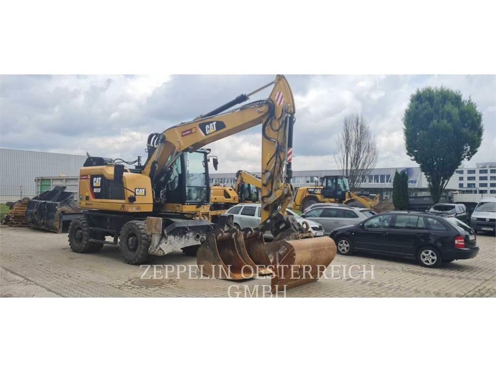 CAT M315F Pelle sur pneus