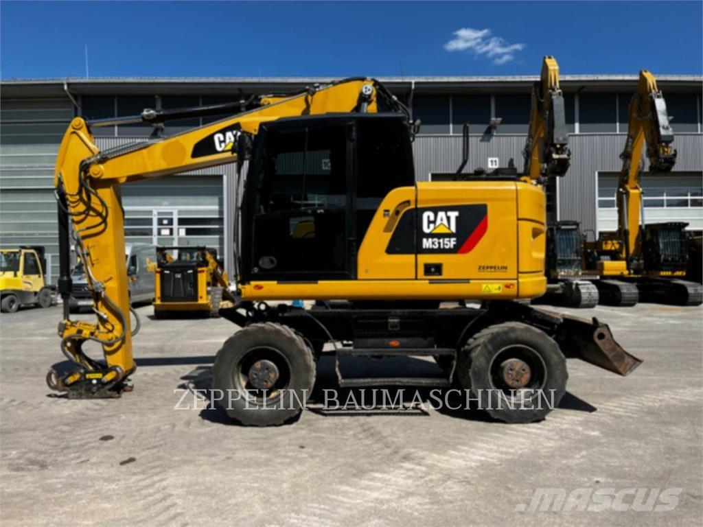 CAT M315F Pelle sur pneus