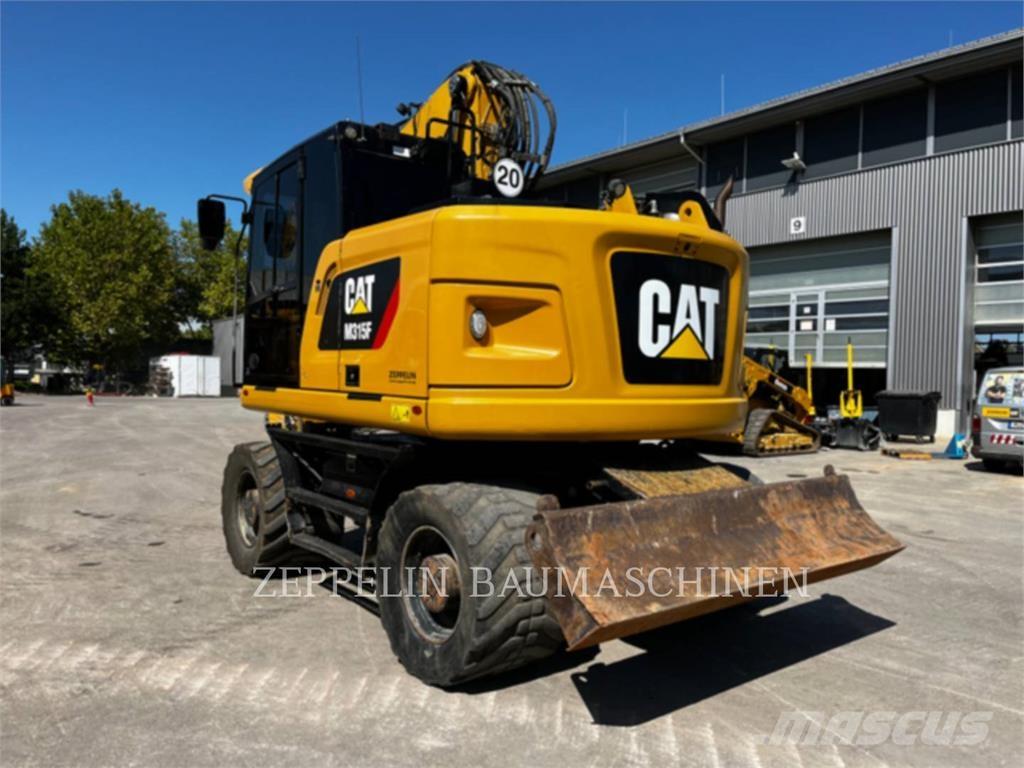 CAT M315F Pelle sur pneus