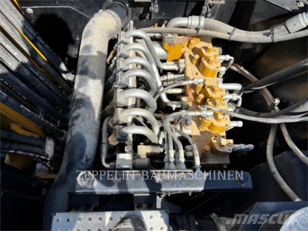 CAT M315F Pelle sur pneus