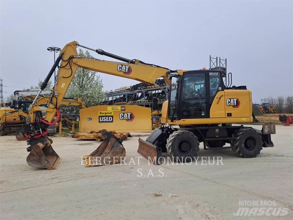 CAT M315F IVC Pelle sur pneus