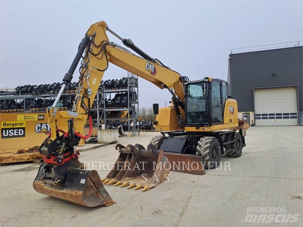 CAT M315F IVC Pelle sur pneus