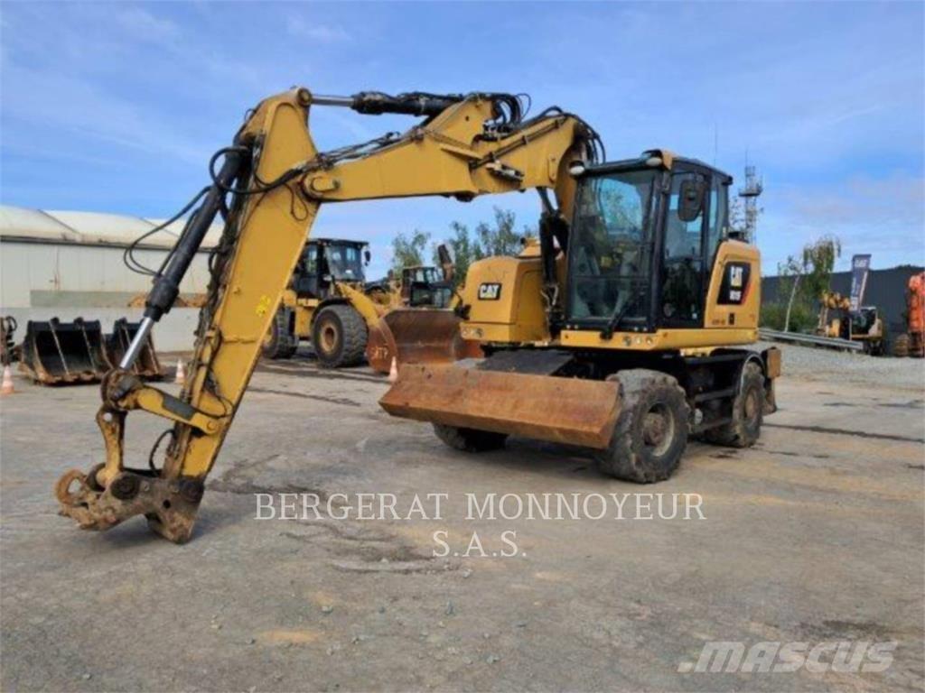 CAT M315F IVC Pelle sur pneus